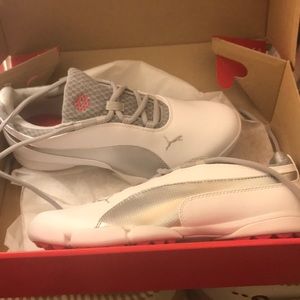 Never worn still in box Puma golf shoes.